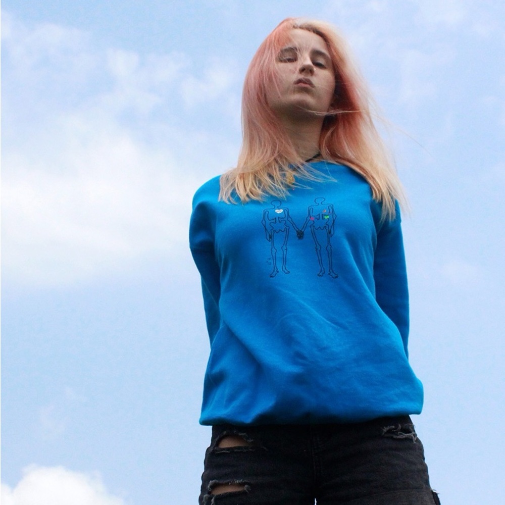 Blue crewneck with skeletons holding hands design